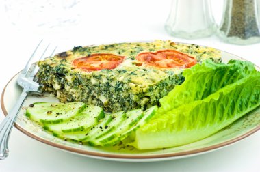 Spinach and feta cheese quiche clipart