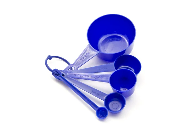 Blue measuring spoons — Stock Photo, Image
