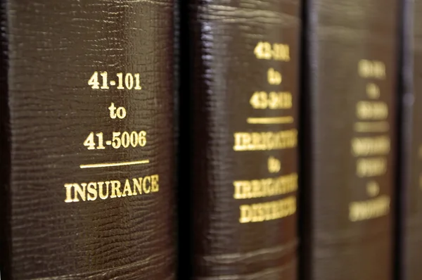 Wetboeken op verzekering — Stockfoto
