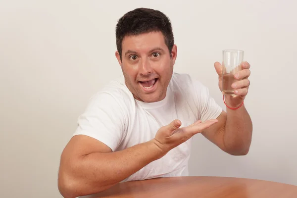 Man pointing to his cup — Stock Photo, Image