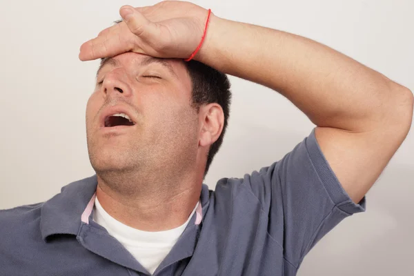 Man wiping his sweat — Stock Photo, Image