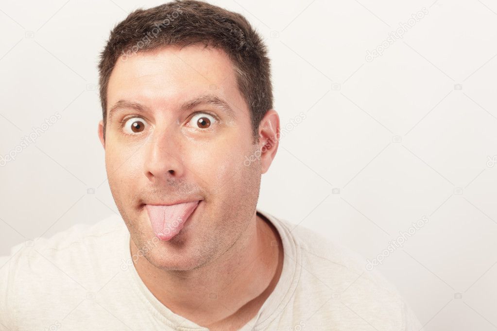 Man sticking out his tongue
