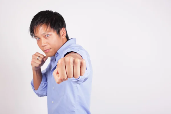 Man throwing a punch — Stock Photo, Image