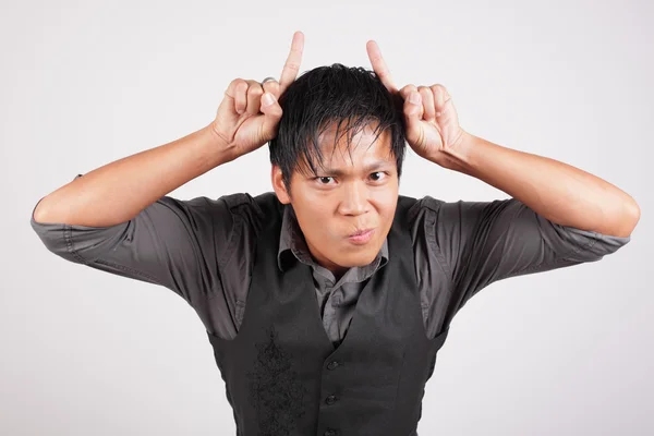 Man with devil horns — Stock Photo, Image