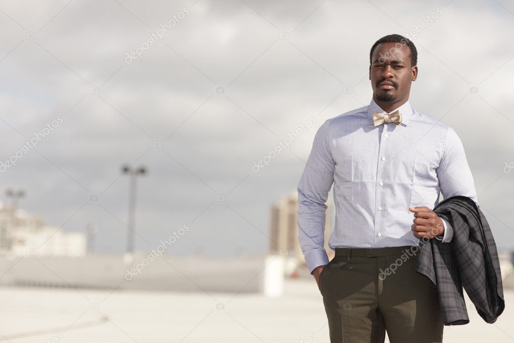 Businessman with jacket over his arm