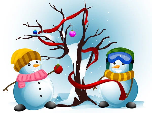 Снеговики, украшающие дерево — стоковое фото
