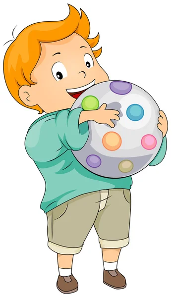 Ребенок держит мяч — стоковое фото