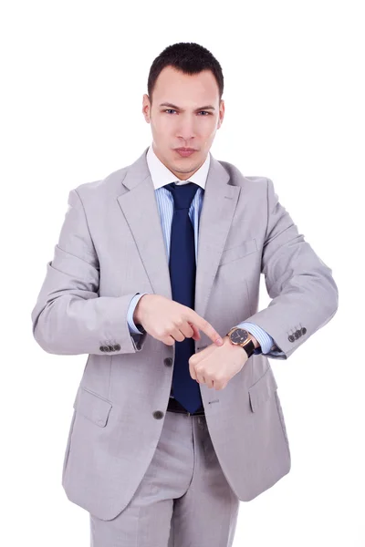 Людина нетерпляче вказує на свій годинник — стокове фото