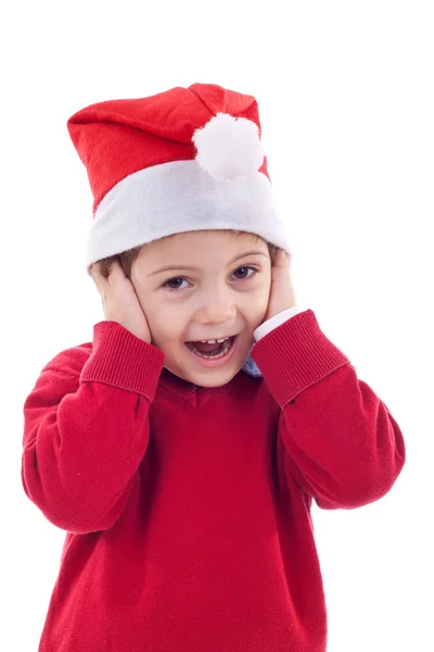 Chłopiec Santa obejmujące jego uszy — Zdjęcie stockowe