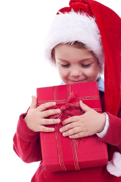 Junge mit einem Weihnachtsgeschenk — Stockfoto