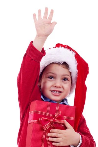 Рождественский мальчик и подарок — стоковое фото