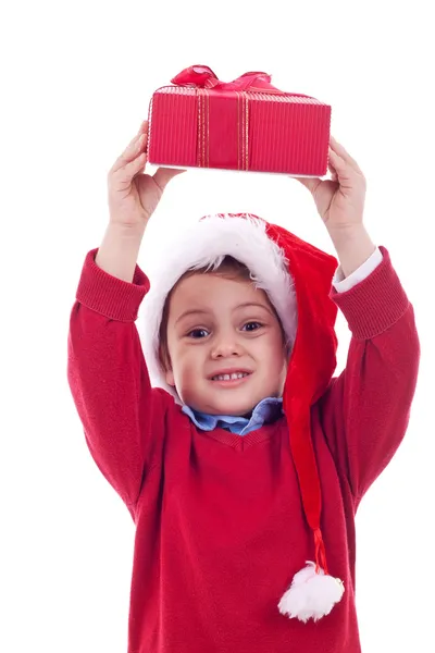 Мальчик с рождественским подарком — стоковое фото
