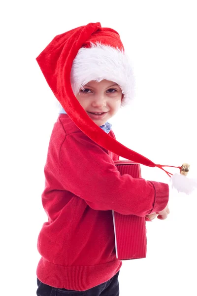 Christmas boy and present — Stok fotoğraf