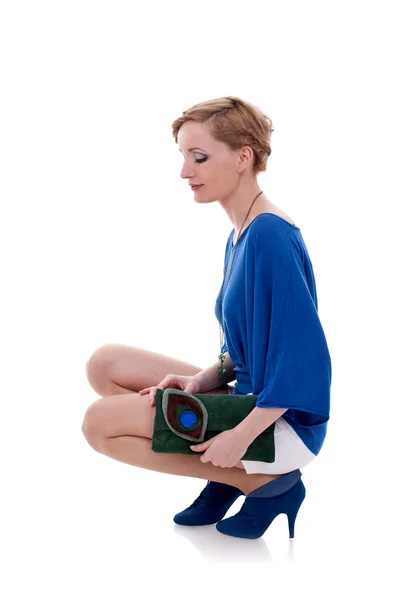 Woman with a green handbag — Stock Photo, Image