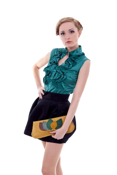 Девушка в элегантном платье и сумочке — стоковое фото