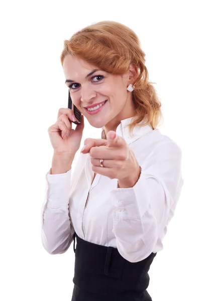 Woman on mobile phone pointing — Stock Photo, Image