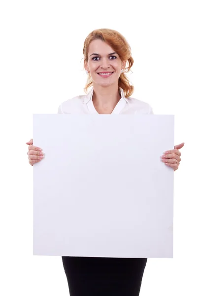 Mulher segurando uma placa branca em branco — Fotografia de Stock