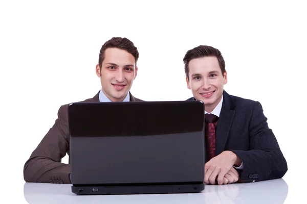 Two business men at a desk — Stock Photo, Image