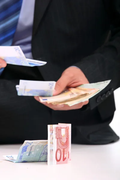 Homem de negócios com notas de euro — Fotografia de Stock