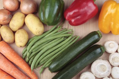 Mixed vegetables on chopping board