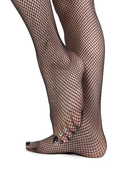 Womanfeet wearing fishnet tights over white background — Stock Photo, Image