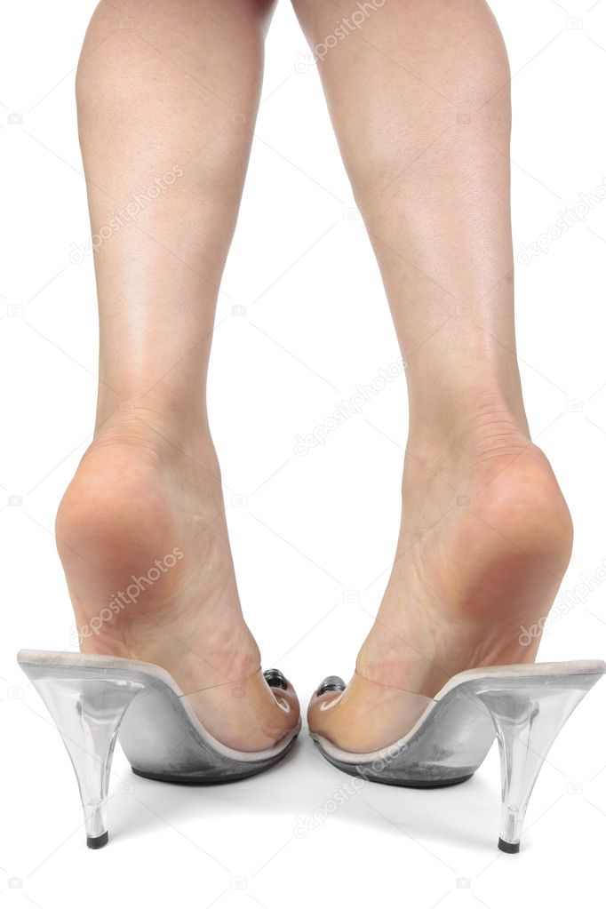 Beautiful woman legs wearing heel shoes