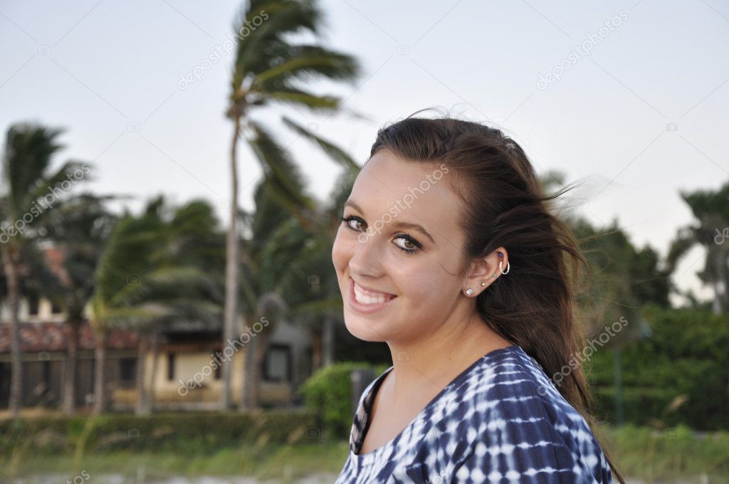 Teenage girl with windblown hair
