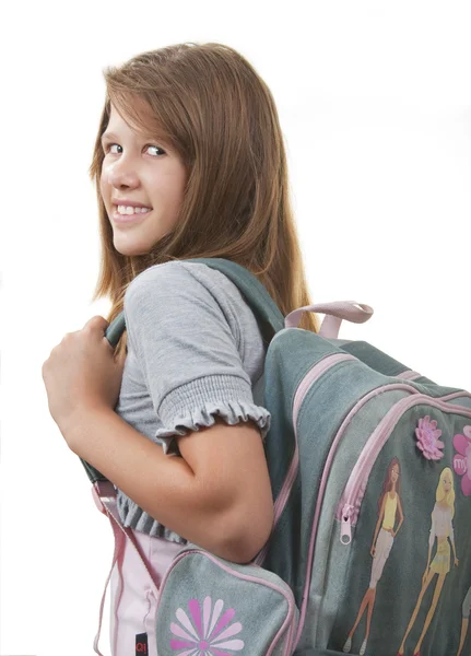 Młoda dziewczyna uśmiechający się z tornister na plecach. — Zdjęcie stockowe