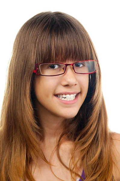 Portrait of the beautiful smiling teenage girl with glasses and dentures. — Stock Photo, Image