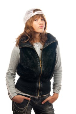 Beautiful teenage rapper girl posing with hands in her pockets. clipart