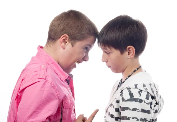 Two teenage boys arguing and screaming at each other — Stock Photo, Image