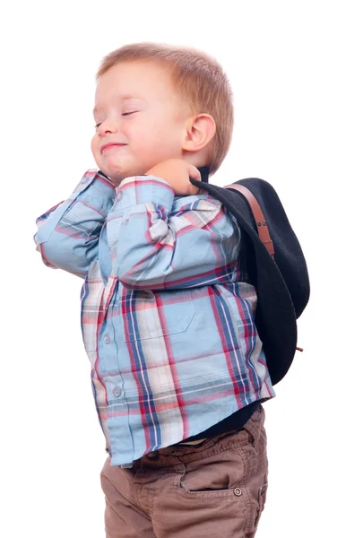 Söt liten pojke ler medan du håller cowboyhatt bakom hans rygg — Stockfoto