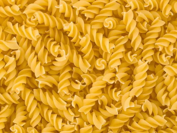 Close up of Uncooked Italian Spiral Pasta - Rotini — стоковое фото