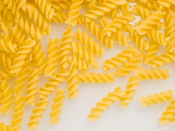 Close up of Uncooked Italian Spiral Pasta - Rotini — стоковое фото
