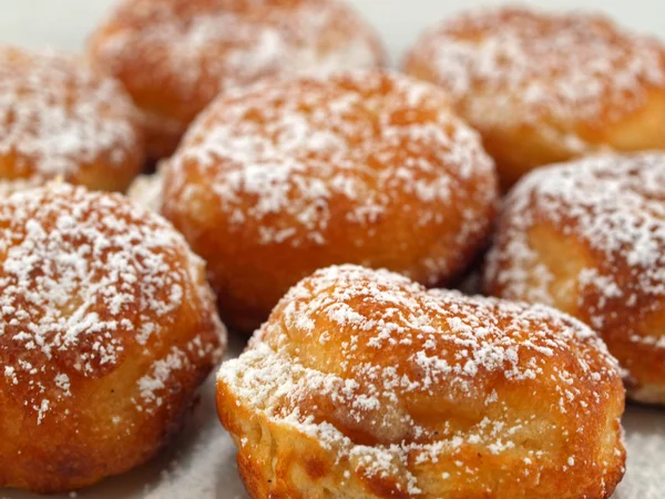 Stock image A Plate of Freshly Made Aebelskivers with Powdered Sugar