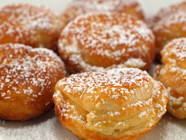 stock image A Plate of Freshly Made Aebelskivers with Powdered Sugar