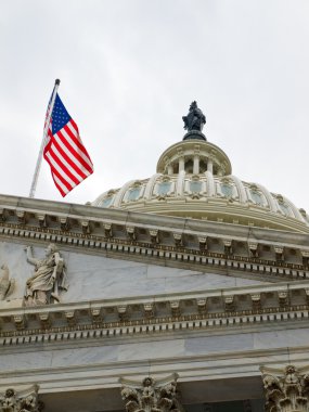 United States Capitol Building in Washington DC with American Flag clipart