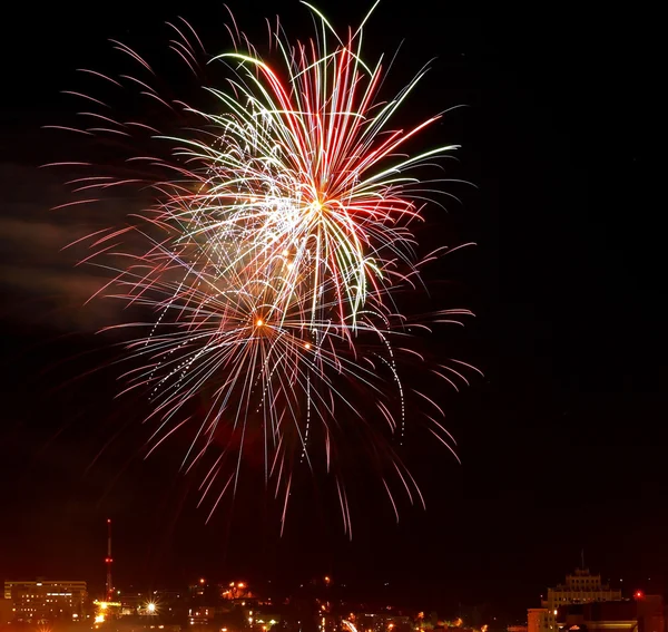 stock image Fireworks Against the Night Sky of a Cityscape