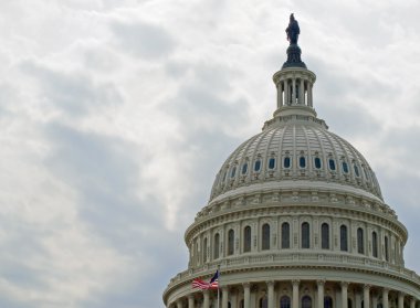 United States Capitol Building in Washington DC with American Flag clipart