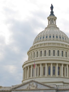 United States Capitol Building in Washington DC with American Flag clipart