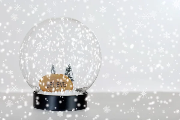 Christmas believe snow globe — Stock Photo, Image