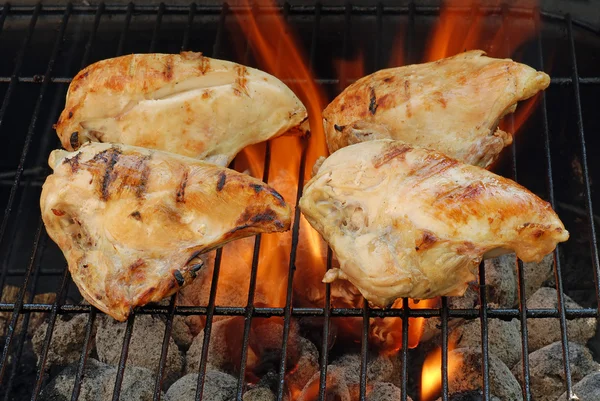 Four barbecue chicken breasts — Zdjęcie stockowe