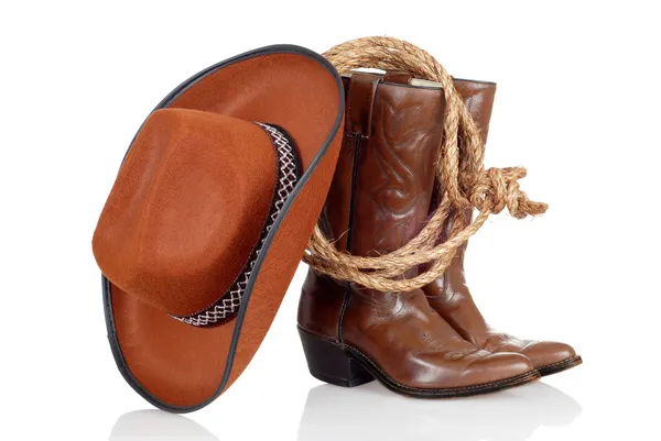 Kovbojské boty čepice a laso — Stock fotografie