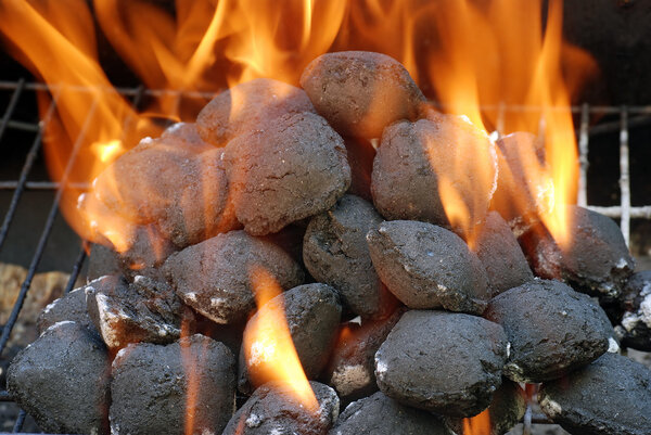 Closeup charcoal barbecue briquettes