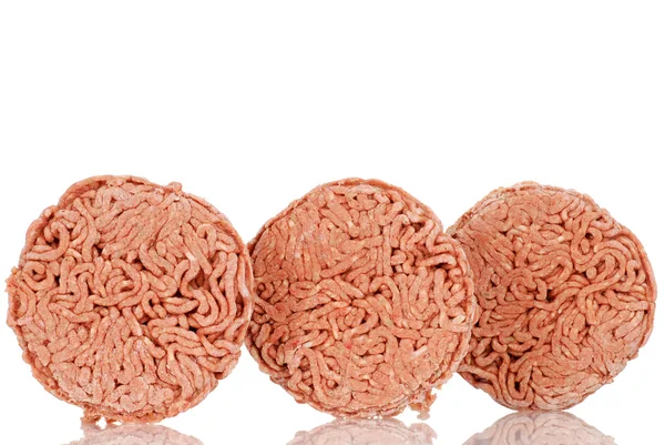 Three frozen hamburger patties — Stock Photo, Image