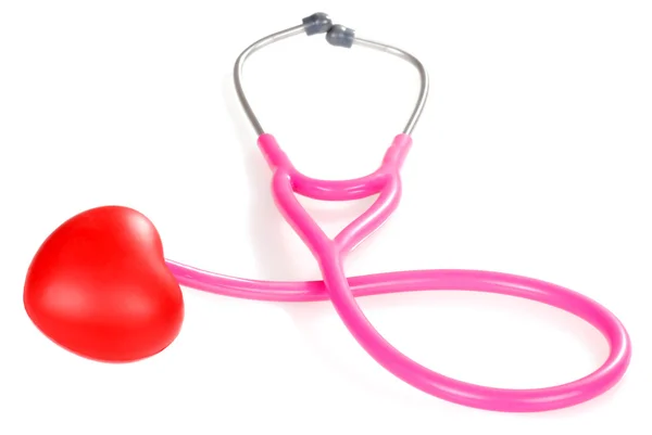 Różowy stetoskop z czerwonym sercem — Zdjęcie stockowe
