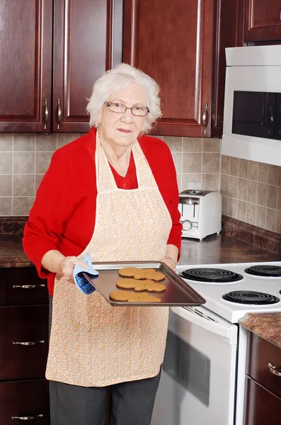Senior woman christmas baking — Stock Photo, Image