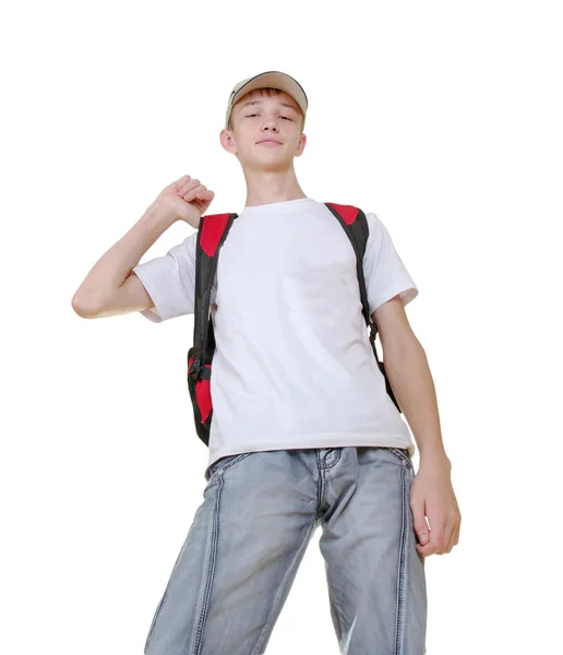Casual adolescente se preparando para a escola de pé — Fotografia de Stock