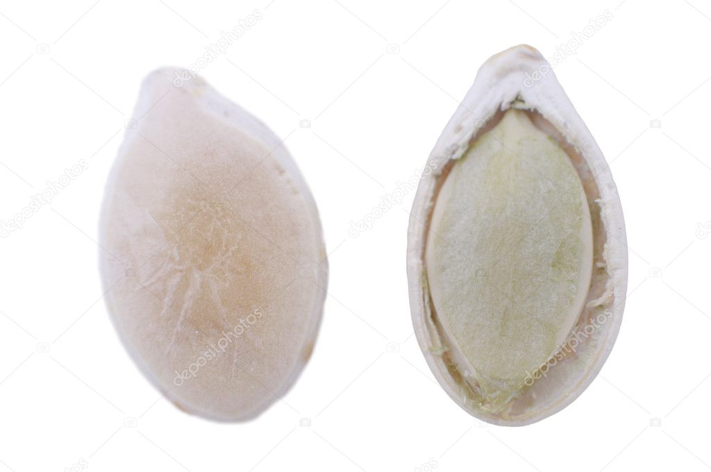 Pumpkin seeds on a white background (isolated with path).
