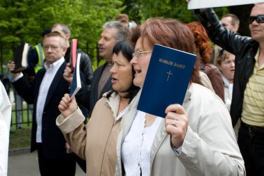 Protestors against Riga pride 2009 clipart